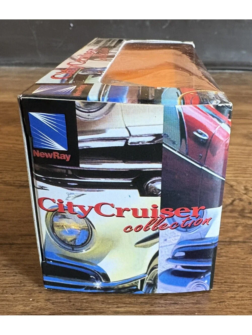 1976 Cadillac Coupe DeVille Convertible in Black - 1:43 New Ray City Cruiser